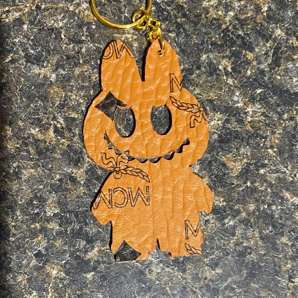 MCM Character Keychain with Gold Ring - Picture 2 of 3